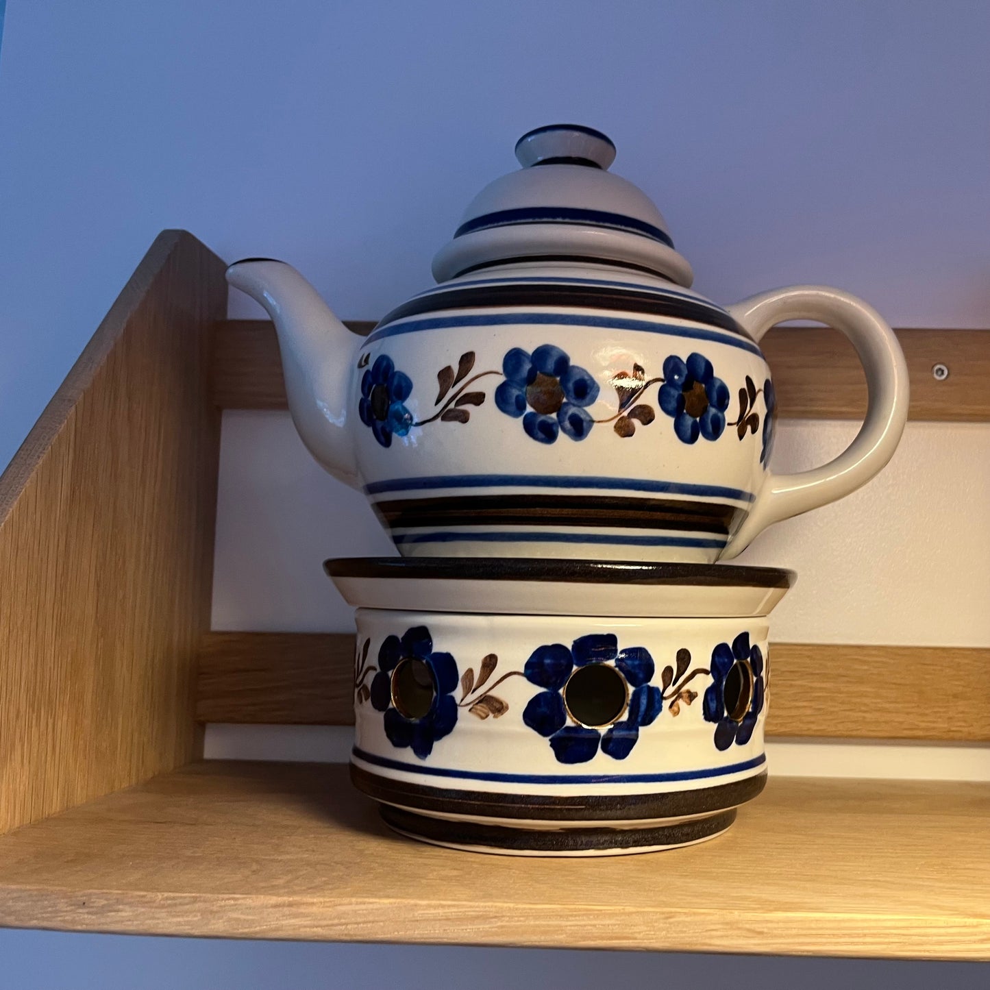 Tekande med lysvarmer